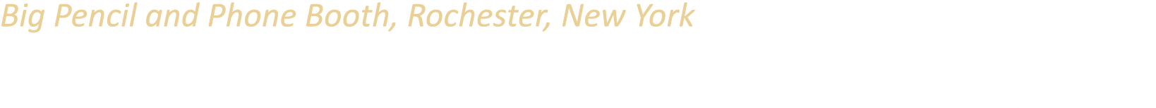 Big Pencil and Phone Booth, Rochester, New York A phone booth and oversized pencil in front of a building housing a l...